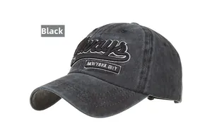 Close-up of Always New York City embroidery on washed vintage black baseball cap