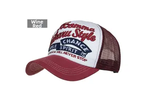 Close-up of wine red mesh trucker hat with embroidered Gamma Style patch and white front panel