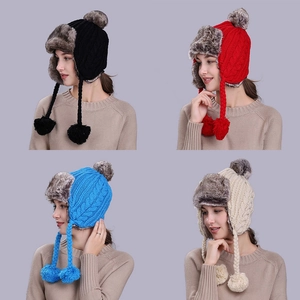 Winter cable knit earflap trapper hat for women in black, red, blue, and cream colors