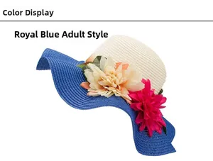 Detail view of woven straw sun hat with royal blue brim and large decorative flowers