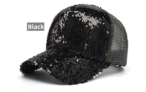 Close-up of black sequined baseball trucker hat with breathable mesh back and adjustable strap