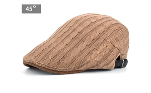 Detail view of khaki cable knit flat cap with brown suede visor and adjustable leather strap