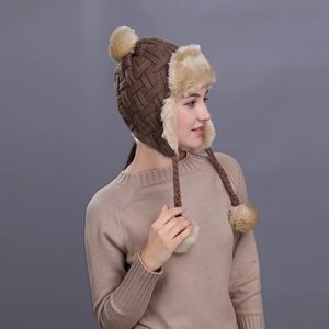 Women's plaid knit aviator hat with faux fur lining and plush pom-pom in dark brown