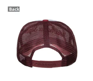 Detail view of burgundy trucker hat back featuring breathable mesh and adjustable snapback strap