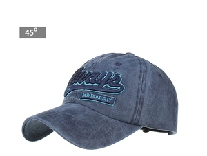 Close-up of vintage blue washed denim baseball cap with New York embroidery details