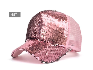 Side view of pink sequin baseball cap with breathable mesh back at 45-degree angle