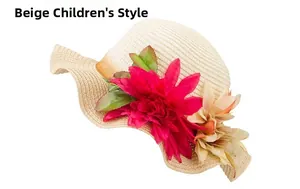 Detail view of beige kids straw hat with large fuchsia flower and green leaf decoration