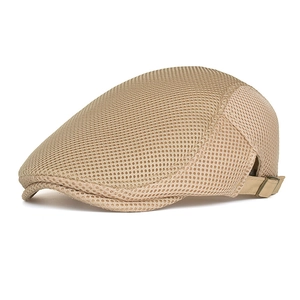 Detail view of khaki mesh newsboy cap showing breathable texture and metal side buckle