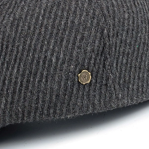 Deep gray wool blend newsboy cap with vertical striped texture and vintage metal W emblem