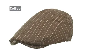 Detail of coffee brown newsboy cap with white pinstripes and metallic side buckle