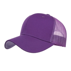 Detail view of the deep purple trucker hat featuring breathable nylon mesh and durable visor