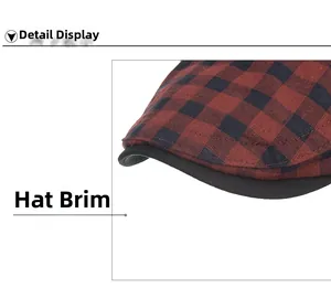 Détail du motif à carreaux rouges et noirs et du bord cousu de haute qualité de la casquette