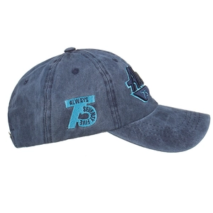 Vintage washed navy baseball cap with bright teal 75 embroidery and curved brim