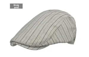 Detail of grey-black striped flat cap showing herringbone fabric texture and short brim
