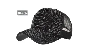 Close-up of black breathable mesh baseball cap decorated with heavy rhinestone studs
