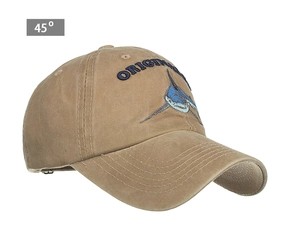 Detailed close-up of embroidered swordfish and original text on khaki cotton baseball cap