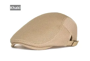 Detail view of khaki mesh newsboy cap with adjustable metal side buckle closure