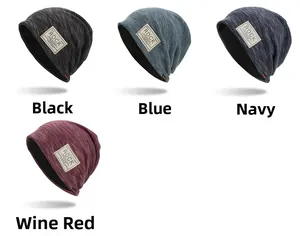 Detailed knit texture and logo patches on multi-colored winter beanies in four colors