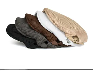 Close-up of breathable mesh flat caps in multiple colors with adjustable metal buckles
