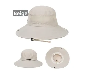 Detail view of beige sun hat featuring breathable mesh, adjustable wind cord, and wide brim