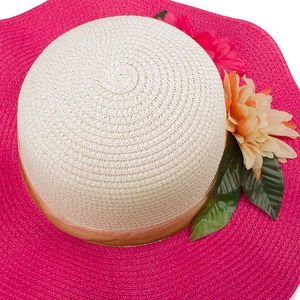 Handwoven wide-brim straw sun hat with vibrant magenta edge and floral decoration