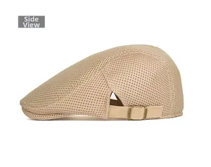 Close-up of side mesh fabric and adjustable metal buckle on beige newsboy cap