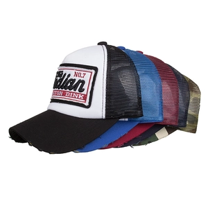 Five distressed washed cotton mesh baseball caps with vintage embroidery on white background