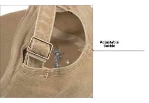 Close-up of khaki washed cotton baseball cap featuring vintage bronze metal buckle adjustment