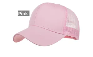 Detailed view of breathable pink mesh baseball cap with reinforced stitching and twill fabric