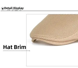 Detail of khaki breathable double-layer mesh fabric on a stylish flat cap crown