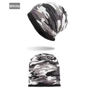 Detail of winter camouflage beanie with warm black fleece lining and grey pattern