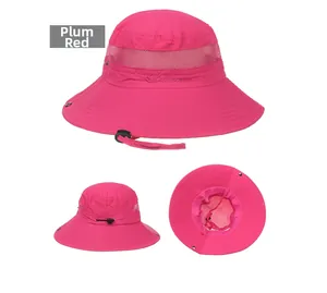 Detail of rose red sun hat featuring breathable mesh crown and wide protective brim