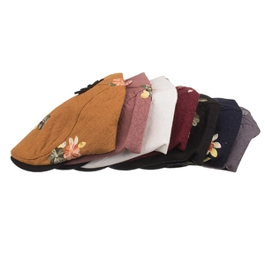 Retro women's newsboy hats with flower embroidery in various colors and textured fabric