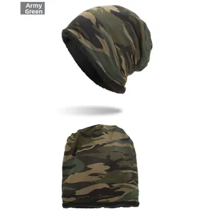 Detail view of army green camo beanie with thick black fleece lining for winter warmth
