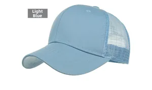 Detailed shot of light blue mesh baseball cap with breathable fabric and twill front