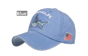 Detailed embroidery of shark and American flag on light blue washed cotton baseball cap