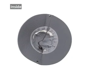 Detail showing breathable mesh lining and adjustable chin strap inside the dark grey sun hat