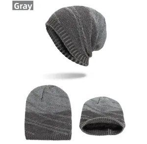 Detailed view of gray knit beanie featuring warm fleece lining and ribbed elastic cuff