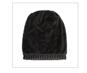 Detailed view of the thick faux fur lining and knit texture on this winter beanie
