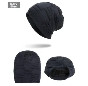 Detail of navy knit beanie showing thick fleece lining and textured grid pattern