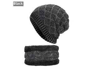 Detail of winter knitted hat and neck warmer set with fleece lining in black and grey