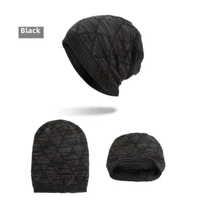 Detail of black knit beanie with diamond pattern and warm fleece lining