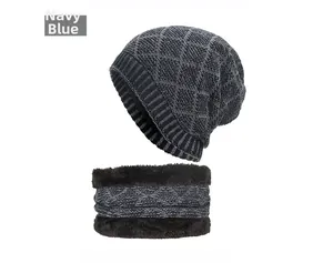 Detail view of navy blue knit beanie and neck warmer set with thick fleece lining