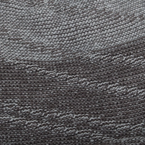 Winter chunky knit beanie in mixed grey and white yarn with warm fleece lining