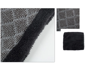 Detail of grey diamond knit neck warmer with soft black faux lamb wool lining and thick fabric