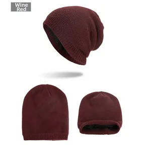 Detail view of wine red winter knit beanie with soft black thickened fleece lining
