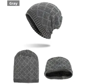 Detail view of grey diamond pattern knitted beanie with thick black fleece lining