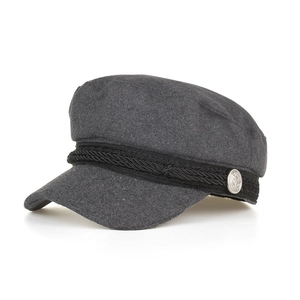 Detailed close-up of dark grey wool baker boy cap with braided rope and silver button