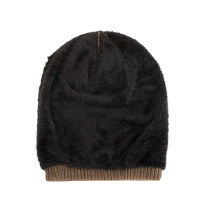 Winter thermal knit beanie featuring thick black plush fleece lining and brown ribbed texture