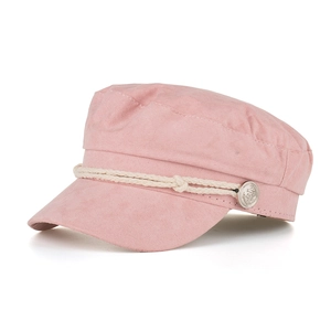 Detail view of pink suede military cap featuring white braided rope and silver anchor button